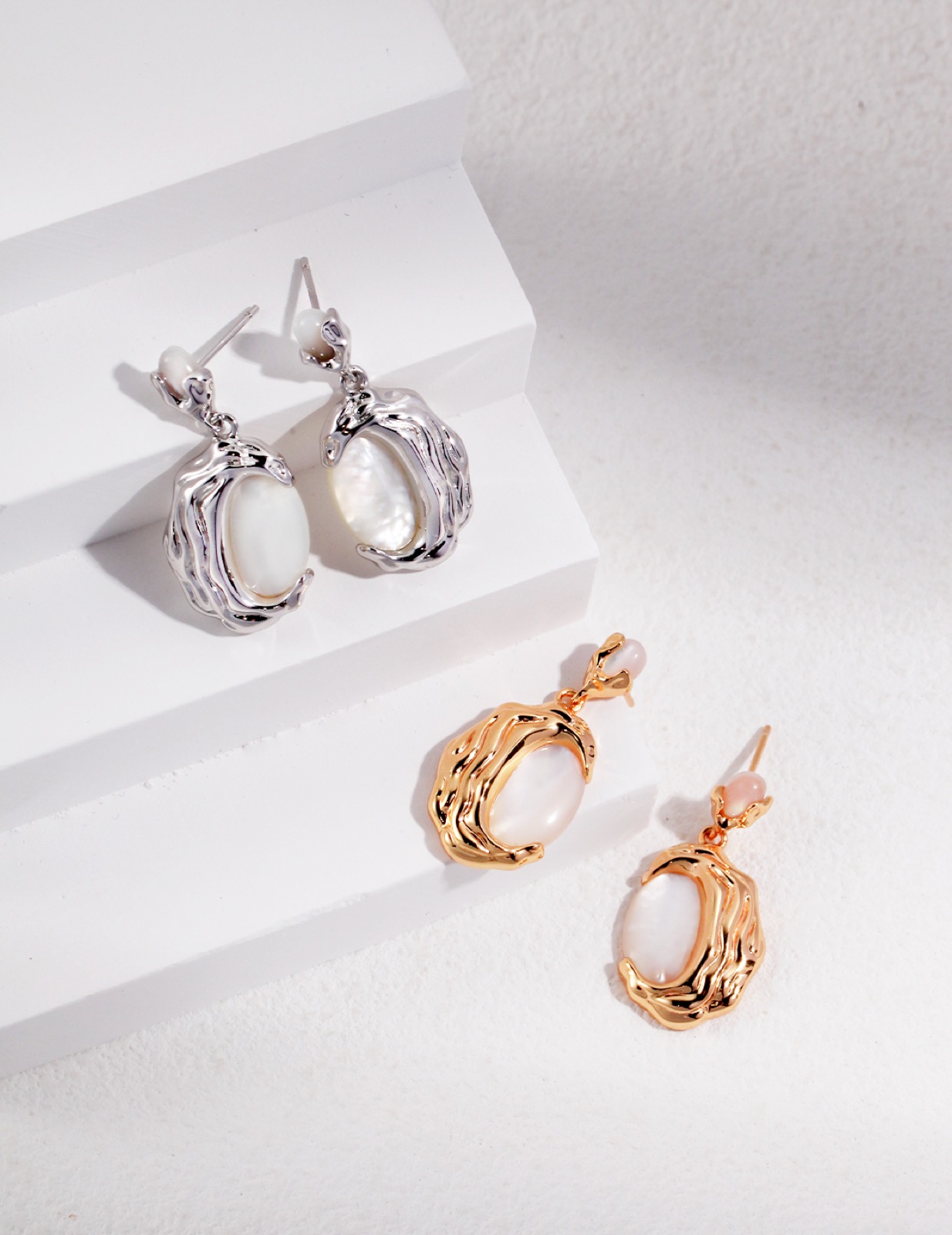 Lava Mother-of-Pearl Set — Molten silver framing natural mother-of-pearl